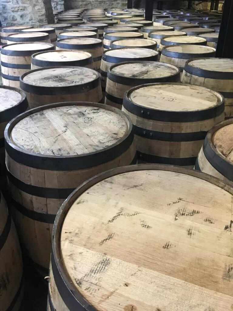 Bourbon barrels at Woodford Reserve, one of the best distilleries to visit on the Kentucky Bourbon Trail